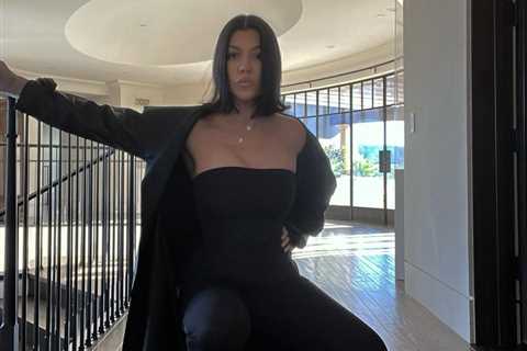 Kourtney Kardashian wears all leather & shows off her curves as fans think star is pregnant..