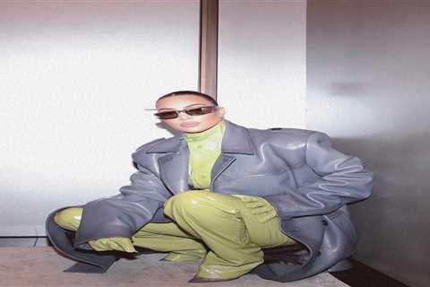Kim Kardashian poses in full green latex suit in new photos as she continues to stun amid drama..