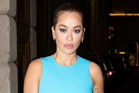 Rita Ora wows in a blue mini dress on a night out in Milan