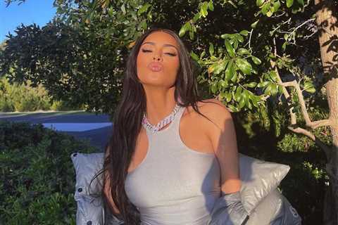 Kardashian fans claim Kim is having a ‘midlife crisis’ as star shows off giant chain with her name..