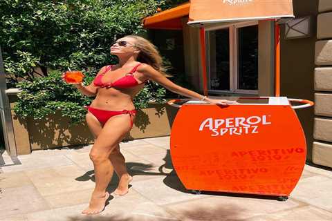 Britain’s Got Talent’s Amanda Holden shows off her sensational body in tiny red bikini