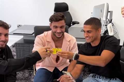 Love Island champ Davide Sanclimenti celebrates with shots after signing six-figure fashion deal