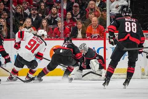 Devils rally past Hurricanes for statement win