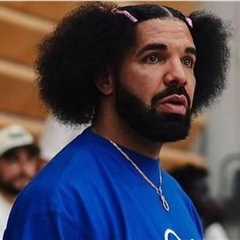 Drake’s Debuts New Hairstyle and a Vintage Fubu Shirt