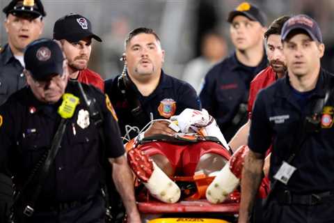 NC State safety Rakeim Ashford stretchered off field after late hit