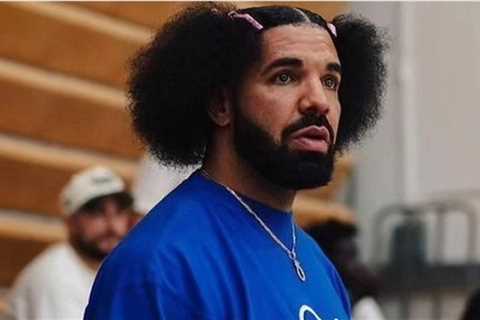 Drake’s Debuts New Hairstyle and a Vintage Fubu Shirt