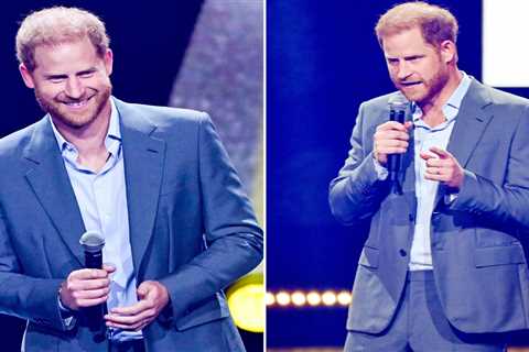 Prince Harry compares himself to JFK and tries to speak German as he opens Invictus Games without..