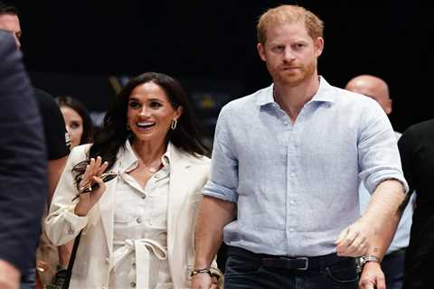 Prince Harry ‘looks anxious’ on birthday as he fiddles with clothes, while Meghan Markle ‘beams at..