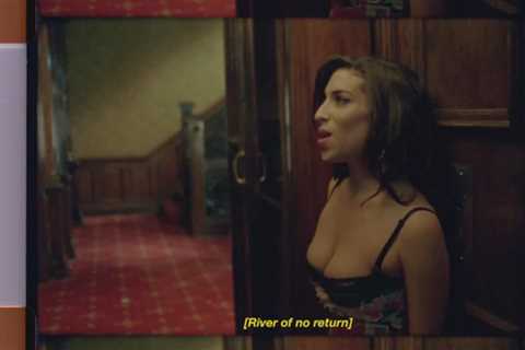 Amy Winehouse Takes a Hotel Stroll in New ‘In My Bed’ Lyric Video Featuring Previously..