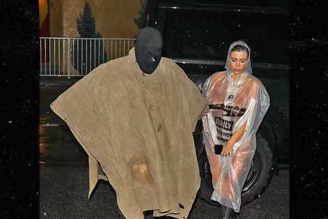 Bianca Censori Goes Naked Under Sheer Raincoat For Outing with Kanye West