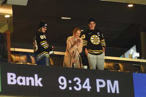 Watch Céline Dion and Her Teenage Sons Adorably Rock Out to Bon Jovi at NHL Game