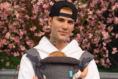 Justin Bieber’s Wax Figure Wears a Baby Carrier at Madame Tussauds Following Hailey Bieber..