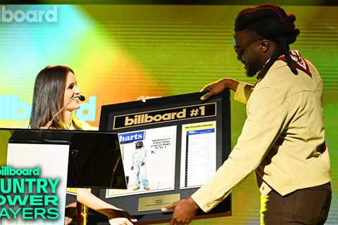 Hannah Karp Presents Shaboozey With Billboard Hot Country Songs Chart Plaque for “A Bar Song..