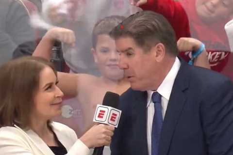 Young boy, shirtless and flexing, steals the show during Peter Laviolette interview