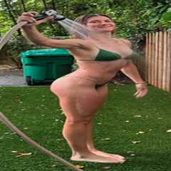 Genie Bouchard turns heads in a green bikini while doing ‘yard work’