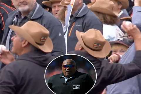 Giants fan ejected after throwing foul ball at umpire Laz Diaz