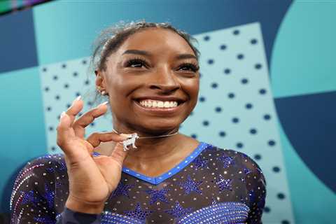 Simone Biles flashes goat necklace after winning 2024 Olympics gold medal