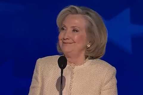 Hillary Clinton Smiles During 'Lock Him Up' Chant Against Trump at DNC