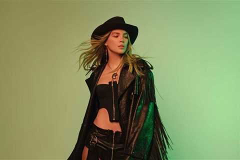 Belinda Falls During L’Oreal Paris Fashion Week Show; Recovers Gracefully With Anitta’s Help