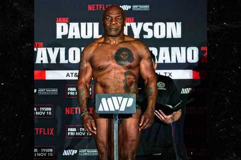 Mike Tyson Shows Off Ripped Body At Weigh-In For Jake Paul Fight