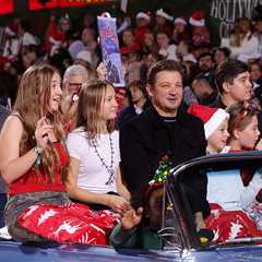 Jeremy Renner & Family Hike Hollywood Christmas Parade After Car Breaks Down