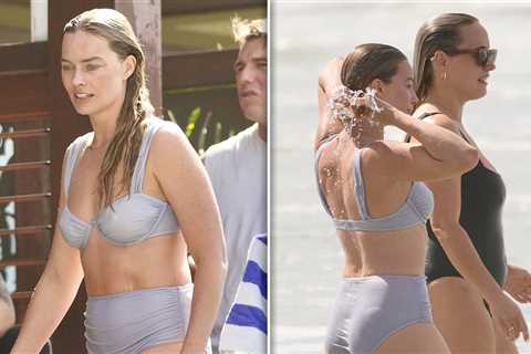 Margot Robbie Soaks Up Sun in Bikini, Wears 'Mama' Necklace on Vacation