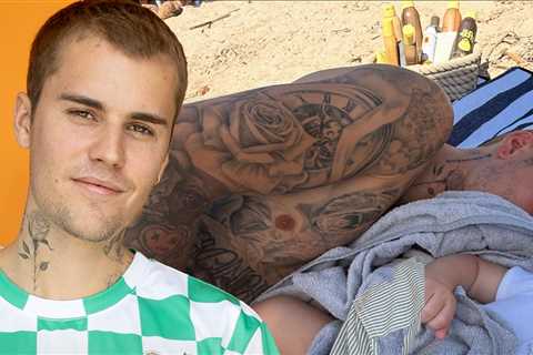 Justin Bieber Cuddles Baby Jack Blues on Euro Beach Vacation