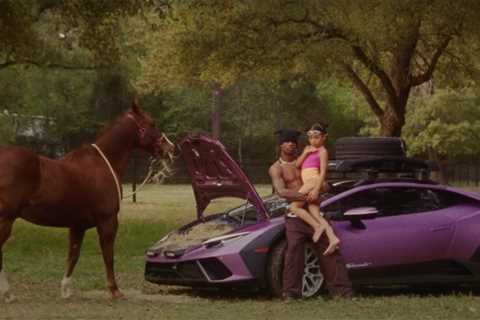 Travis Scott Brings Lamborghinis To the Stables & the Strip Club In Countryside ‘Kick Out’ Video