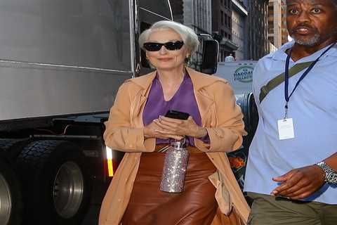 Meryl Streep Wears Purple Blouse and Brown Leather Skirt on Set of Devil Wears Prada 2
