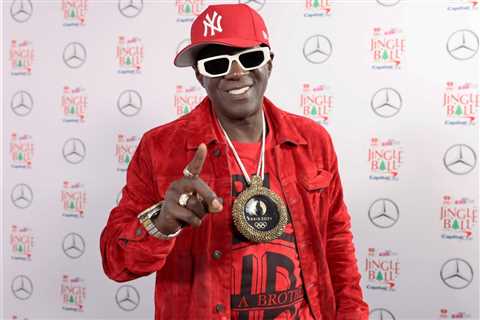 ‘King Swiftie’ Flavor Flav Celebrates the Start of August With Taylor Swift Lyrics
