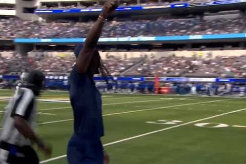 Cowboys star CeeDee Lamb takes big hit from sprinting official while on sideline