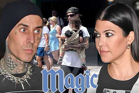 Travis Barker Holds Son Rocky, Hangs Out with Family at Magic Kingdom