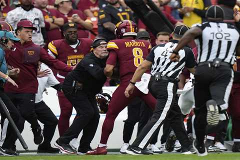 Commanders coach Dan Quinn bloodied after head-on collision with Marcus Mariota