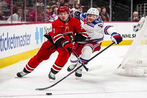 Rangers blow lead in OT loss to Metro-leading Hurricanes as they hit disappointing halfway point