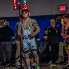 Controversial New Jersey wrestling champion, father sentenced for roles in wild brawl in stands