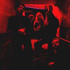 Johnny Blue Skies & the Dark Clouds Set Upcoming Album ‘Mutiny After Midnight’ — And It’s a..