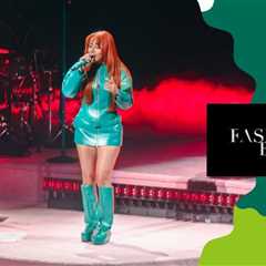 Mariah The Scientist Performed in DC in a Teal Green $1,478 KNWLS ‘Neo’ Coat and Custom Laura..