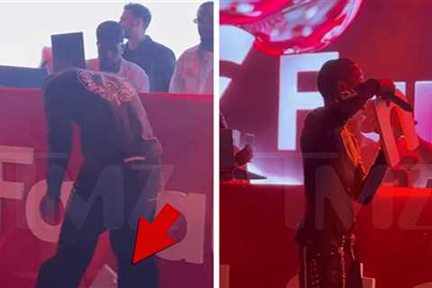 Travis Scott Pulverizes Sign on Video During Pre-Super Bowl Performance