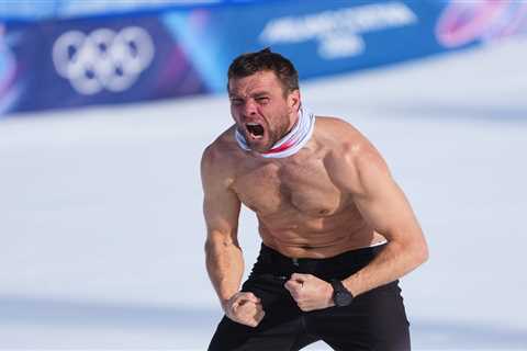 Austrian snowboarder Benjamin Karl rips off shirt after winning gold in his final Olympics