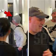 CM Punk Smacks Away Fan's Phone After WrestleMania Loss to Roman Reigns, on Video