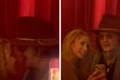 Johnny Depp Gets Close With Mystery Blonde At Rum Launch Party