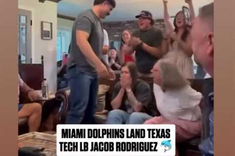 Dolphins pick shares hug with Army Black Hawk pilot wife in emotional NFL draft moment