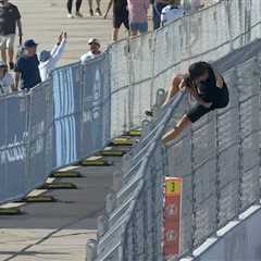 Crazed NASCAR fan climbs onto California track to fist-bump driver: ‘He’s wasted’