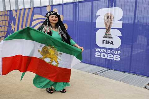 Iranian fans defy FIFA ban again as forbidden flags flood stadium during World Cup clash with..