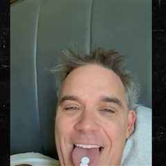Robbie Williams Addresses White Substance on Mic During World Cup Broadcast